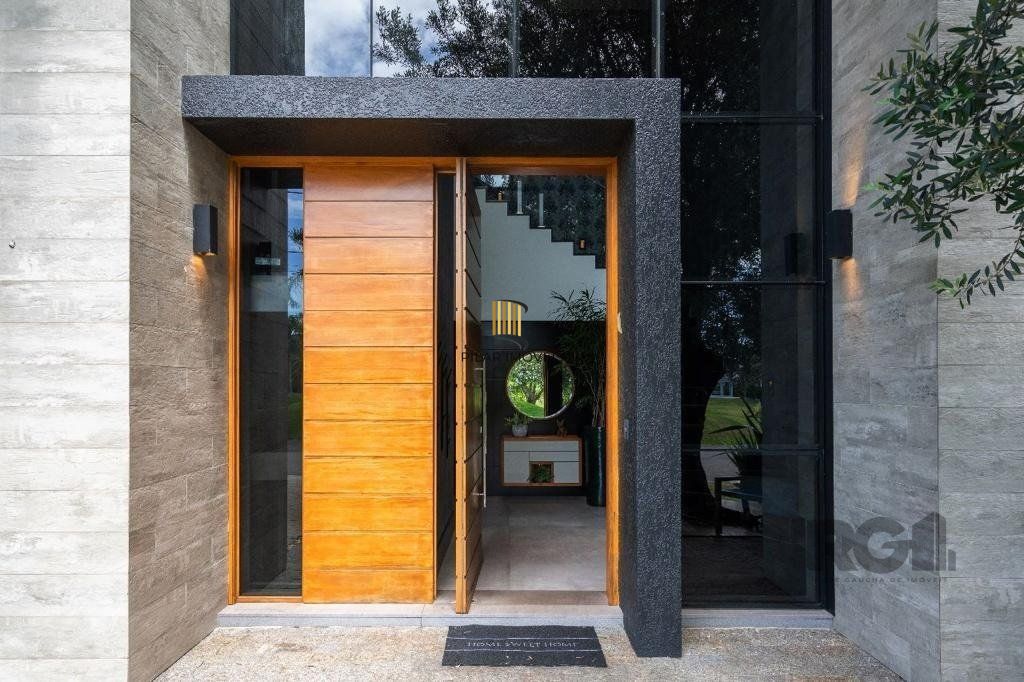 Casa de Condomínio 6 dormitórios no bairro Atlântida Sul