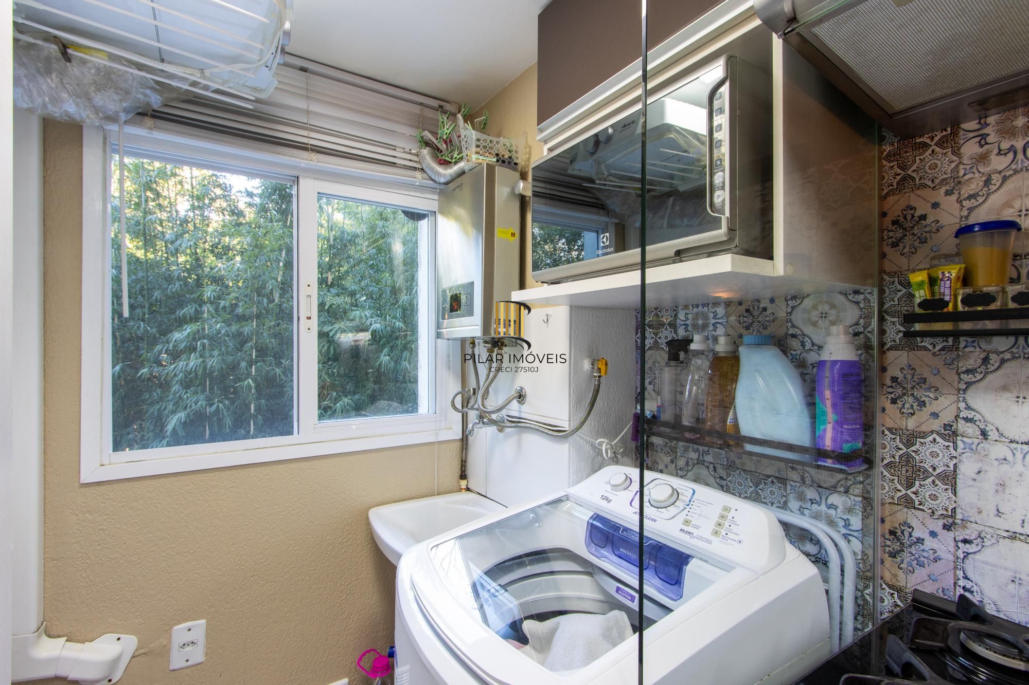 Apartamento  com  2 dormitórios, cozinha americana, Banheiro social, gás central, 1 vaga
