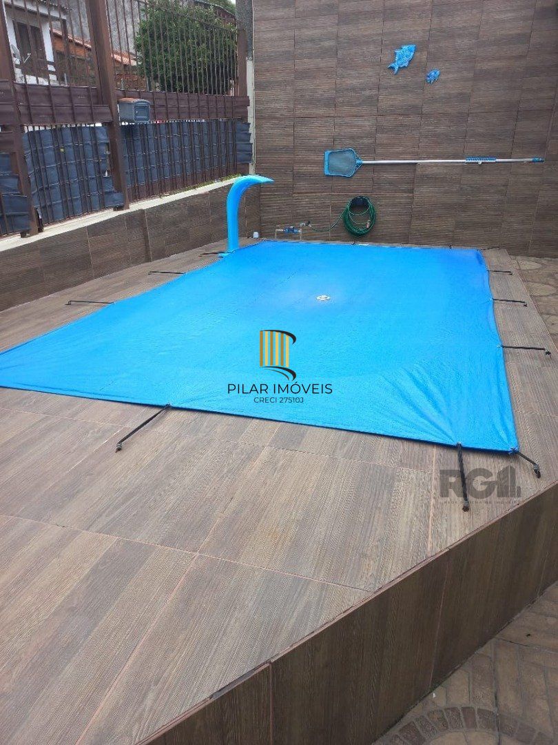 Casa 2 dormitórios com piscina na Vila Nova Porto Alegre