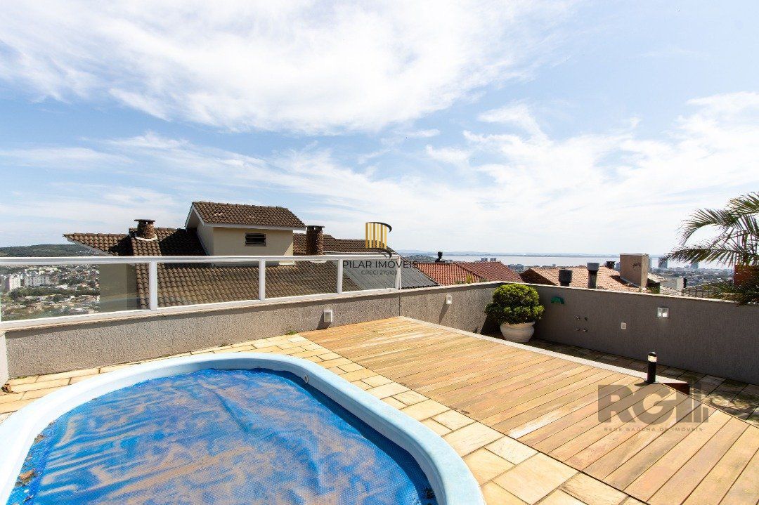 Casa de Condomínio 4 dormitórios no bairro Nonoai