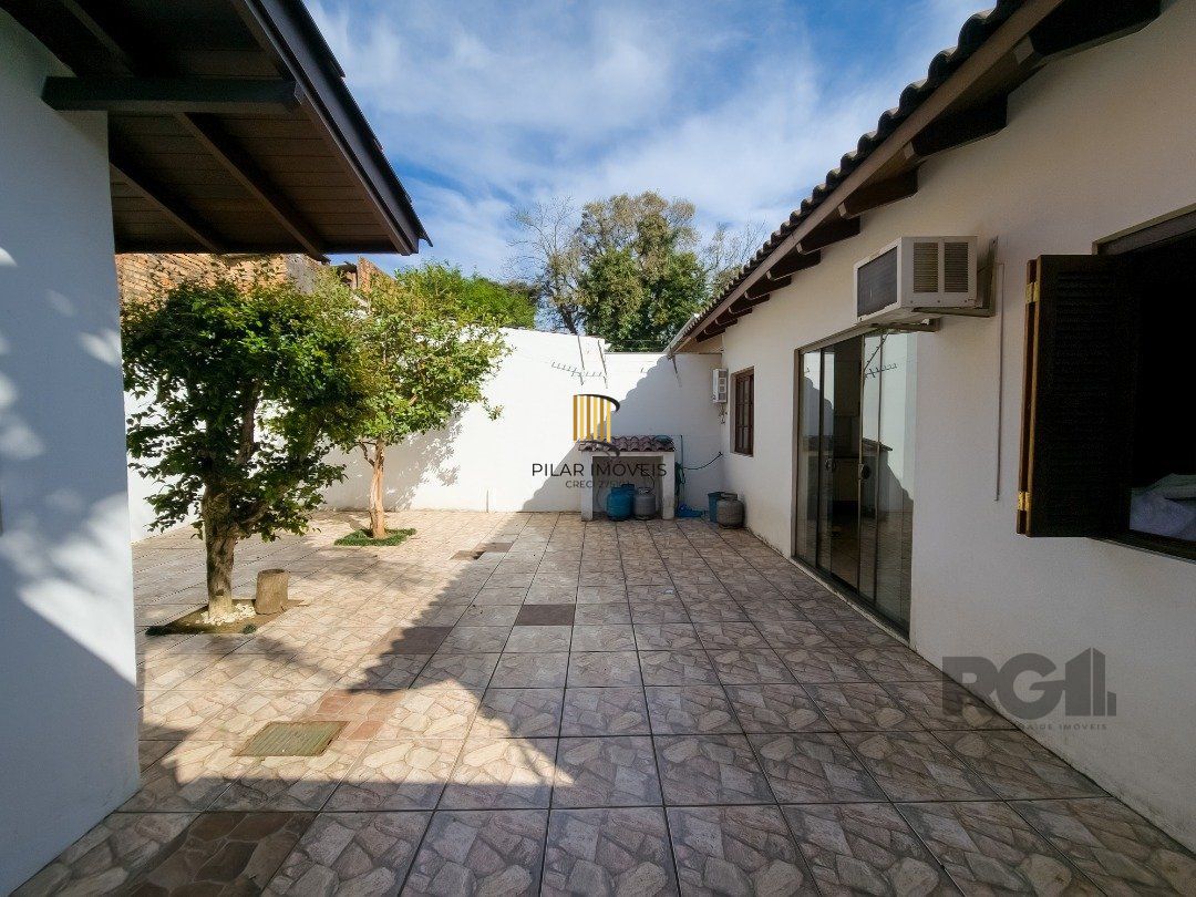 Casa 4 dormitórios no bairro Glória