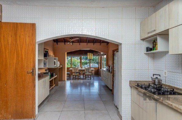 Casa no Bairro Vila Assunção com 4 dormitórios sendo 1 suíte e vista para o Guaíba