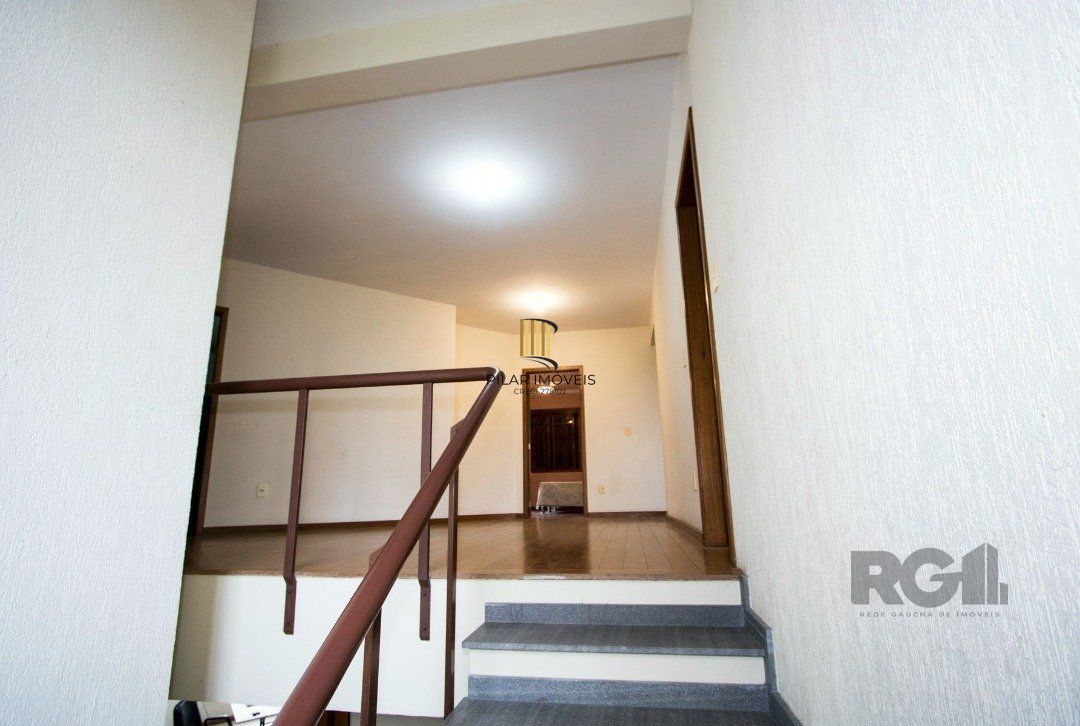 Sobrado com 6 suites, lareira, lavabo, pátio - Bairro Belém Velho