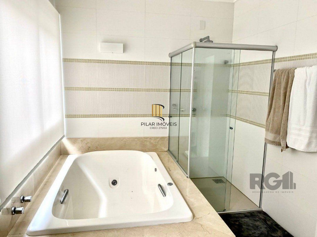 Casa de Condomínio 4 dormitórios no bairro Atlântida