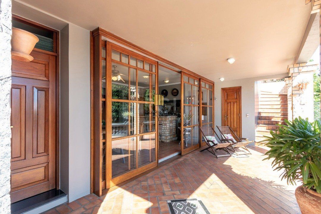 Casa Condominio para Venda - 559m², 4 dormitórios, sendo 3 suites, 3 vagas - Cavalhada