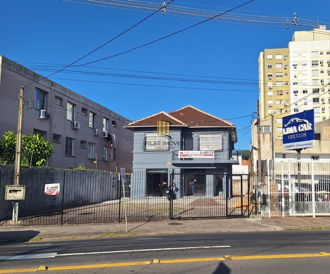 Casa 5 dormitórios no bairro Azenha - Pilar Imóveis