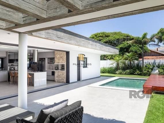 Casa 5 dormitórios no bairro Atlântida