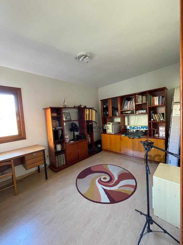 Casa de Condomínio 4 dormitórios no bairro Cavalhada