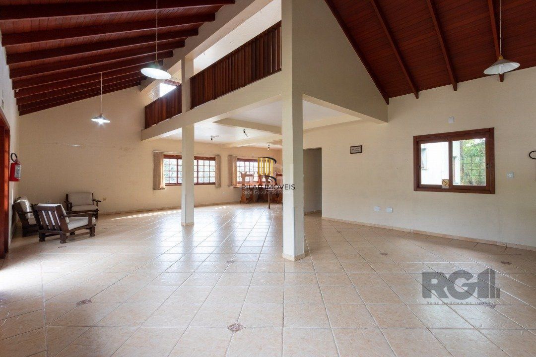 Casa de Condomínio 4 dormitórios no bairro Cavalhada