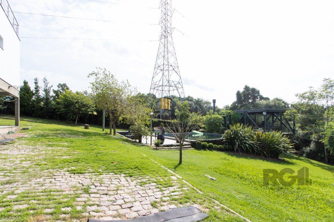 Casa de Condomínio 4 dormitórios no bairro Vila Nova