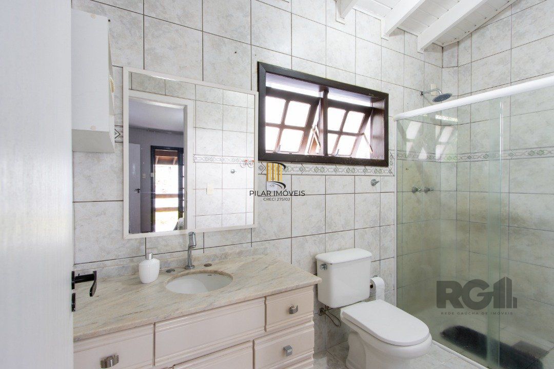 Casa 3 dormitórios no bairro Camaquã