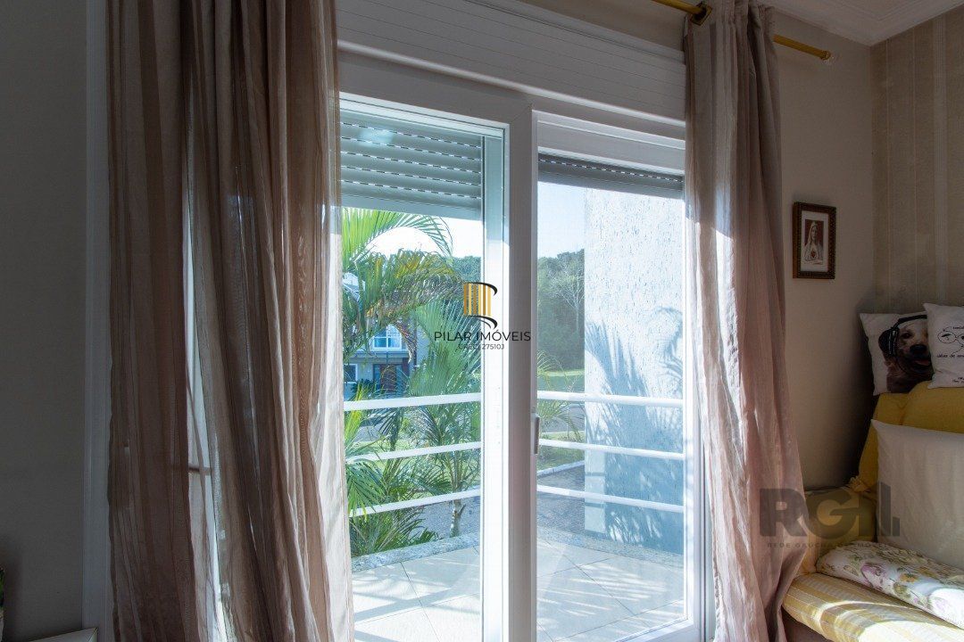 Casa de Condomínio 3 dormitórios no bairro Vila Nova
