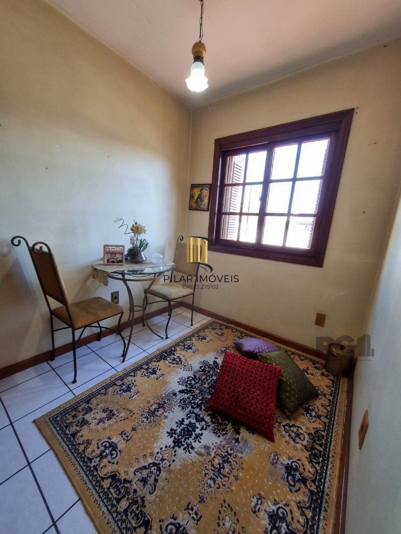 Casa de Condomínio 3 dormitórios no bairro Camaquã