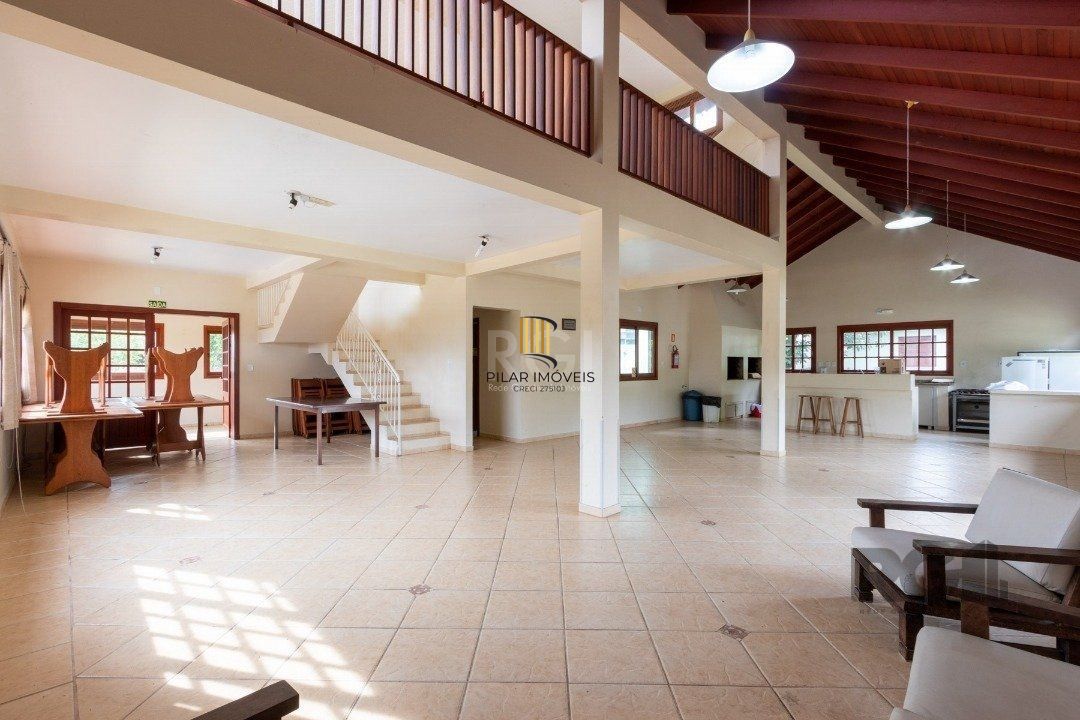 Casa de Condomínio 4 dormitórios no bairro Cavalhada