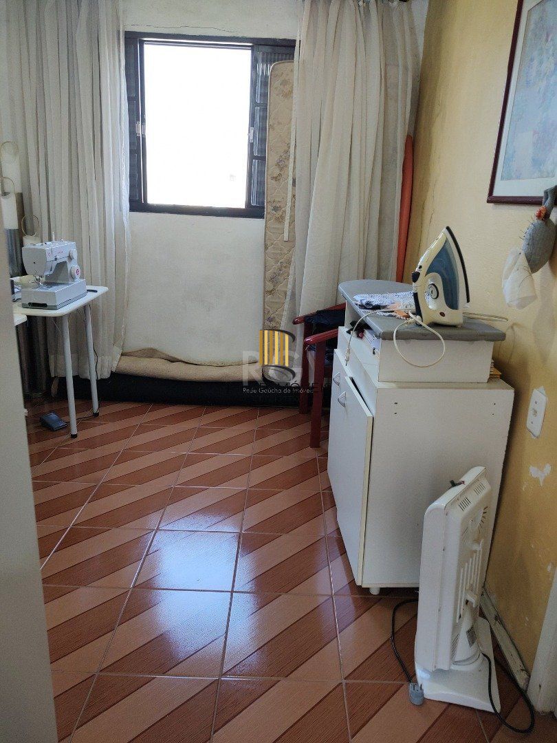 Casa 3 dormitórios no bairro Partenon