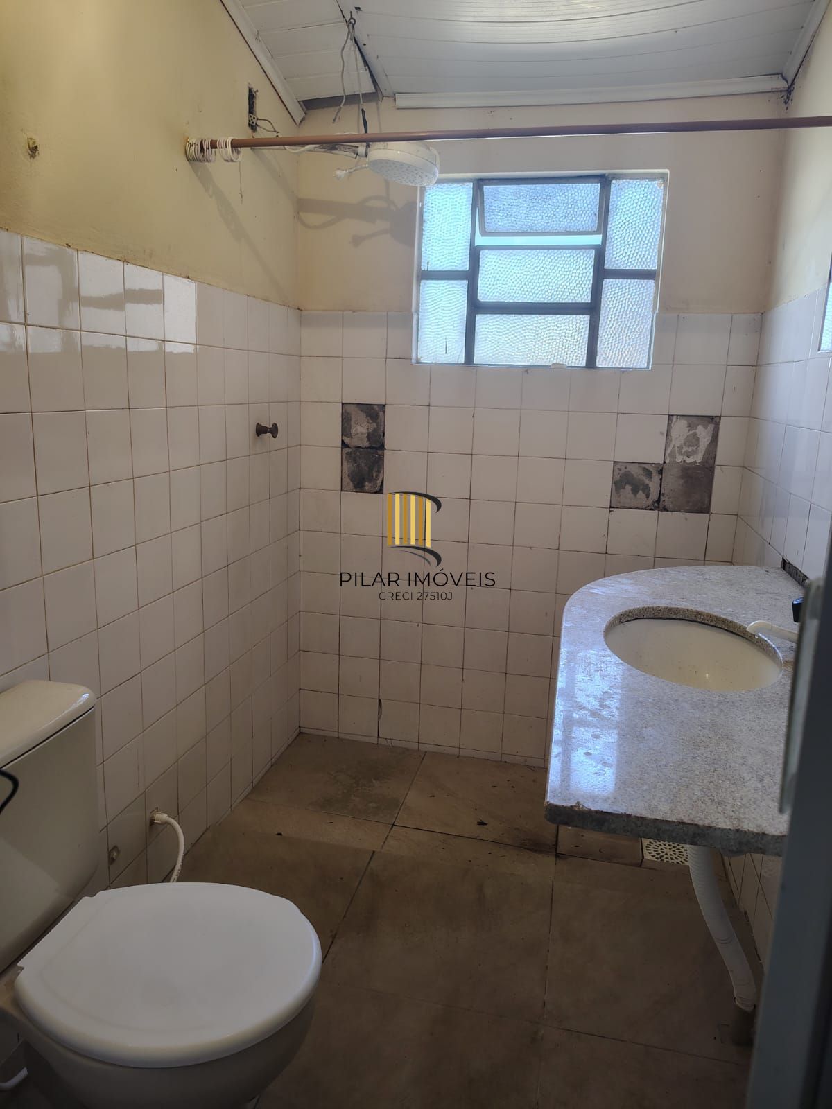 Casa térrea no bairro Vila Nova.