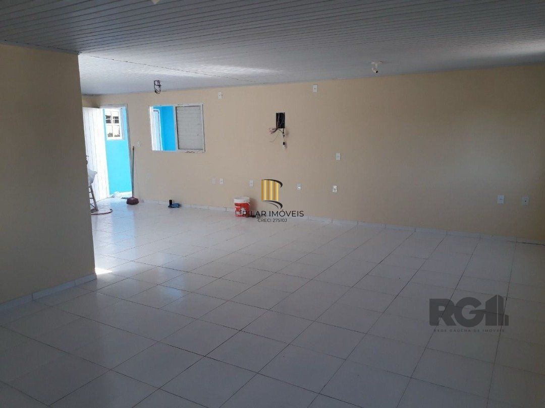 Oportunidade Imperdível: Prédio com 4 Apartamentos, Pátio e 2 Vagas de Garagem