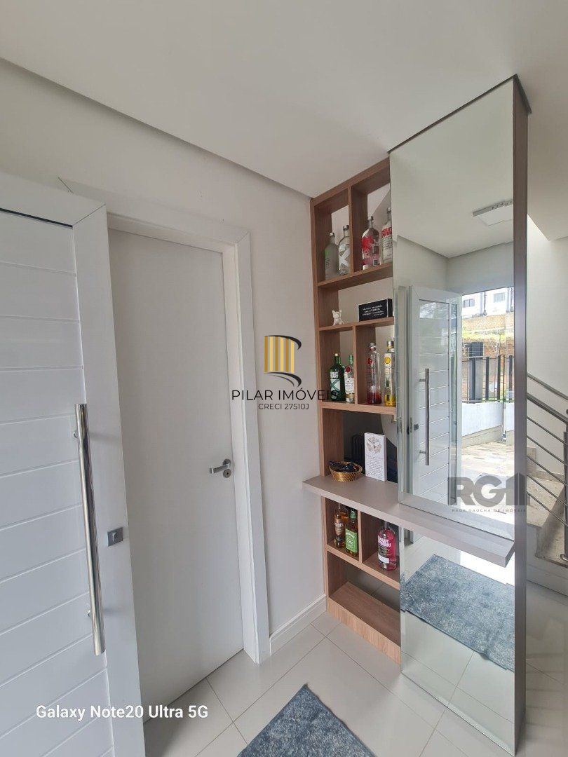 Casa 3 dormitórios no bairro Guarujá