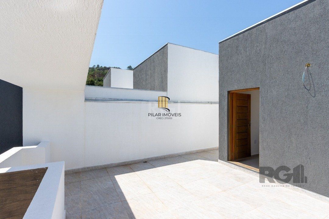 Casa 3 dormitórios no bairro Guarujá