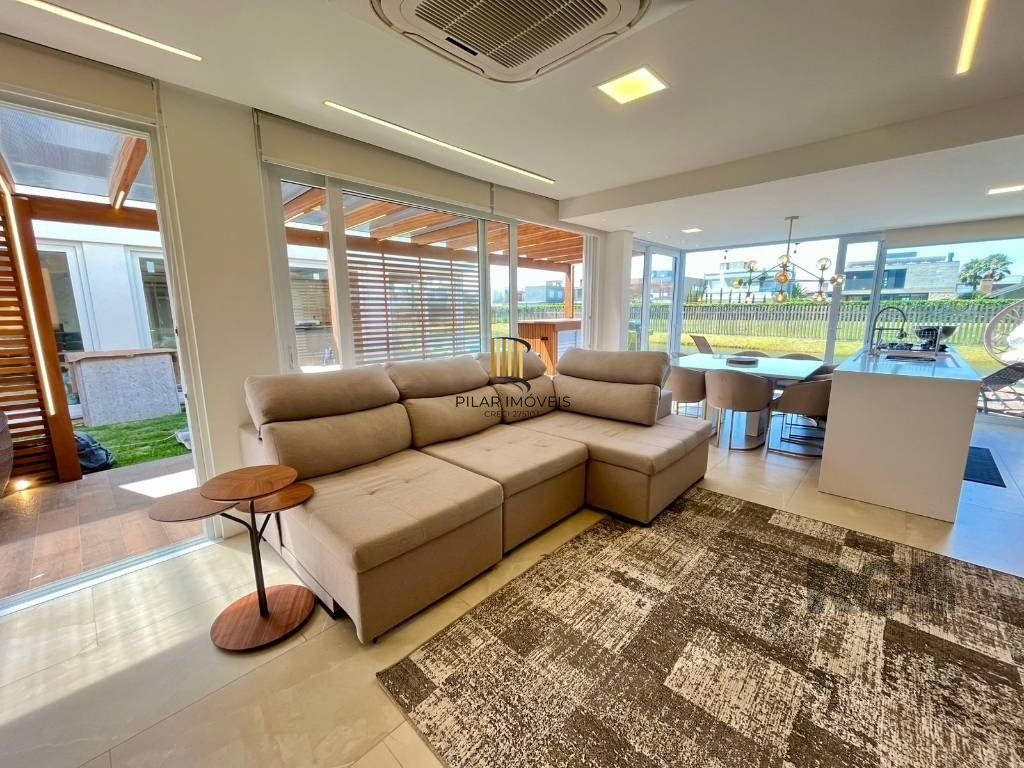 Casa de Condomínio 4 dormitórios no bairro Atlântida
