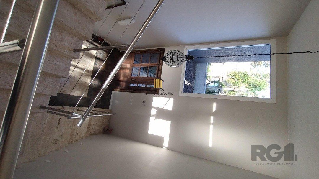 Casa de Condomínio 5 dormitórios no bairro Atlântida