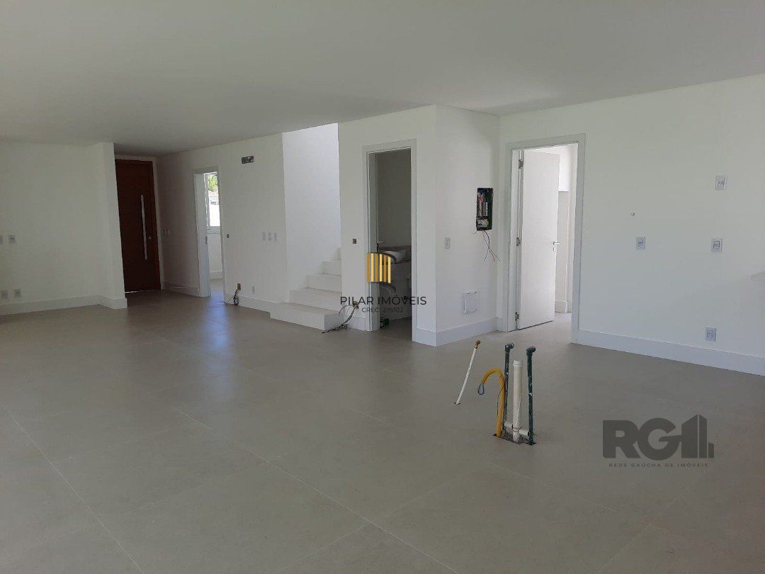 Casa de Condomínio 4 dormitórios no bairro Nova Xangri-lá