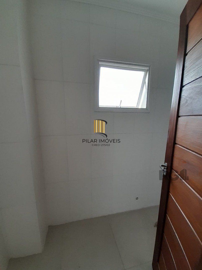 Casa 3 dormitórios no bairro Camaquã