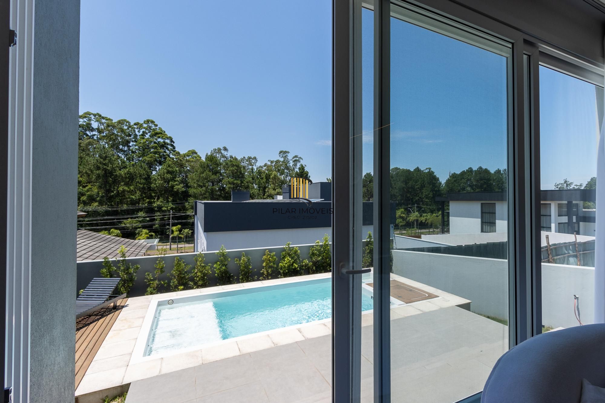 Casa de Condomínio 4 dormitórios no bairro Vila Nova