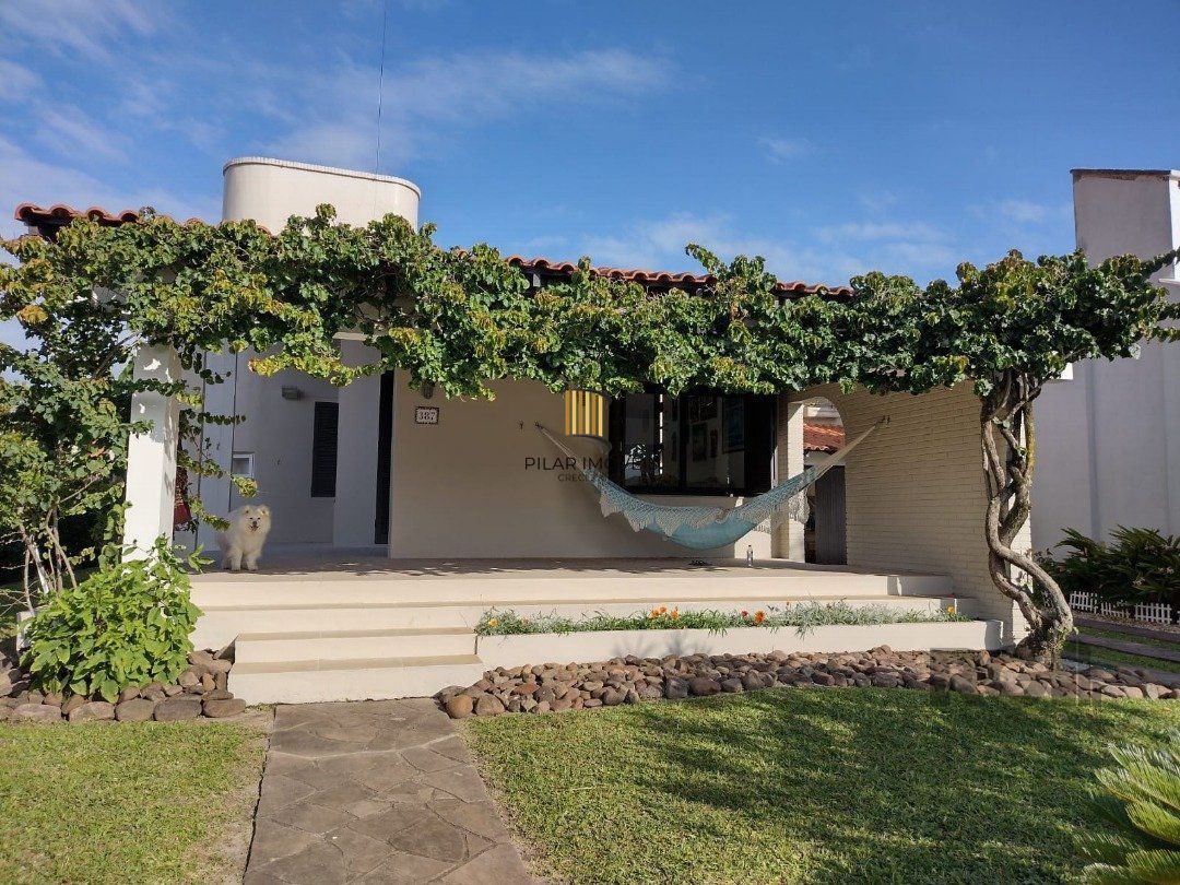 Casa 4 dormitórios no bairro Atlântida - Pilar Imóveis