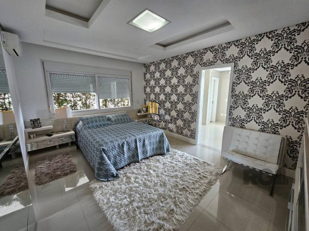 Casa de Condomínio 4 dormitórios no bairro Atlântida Sul