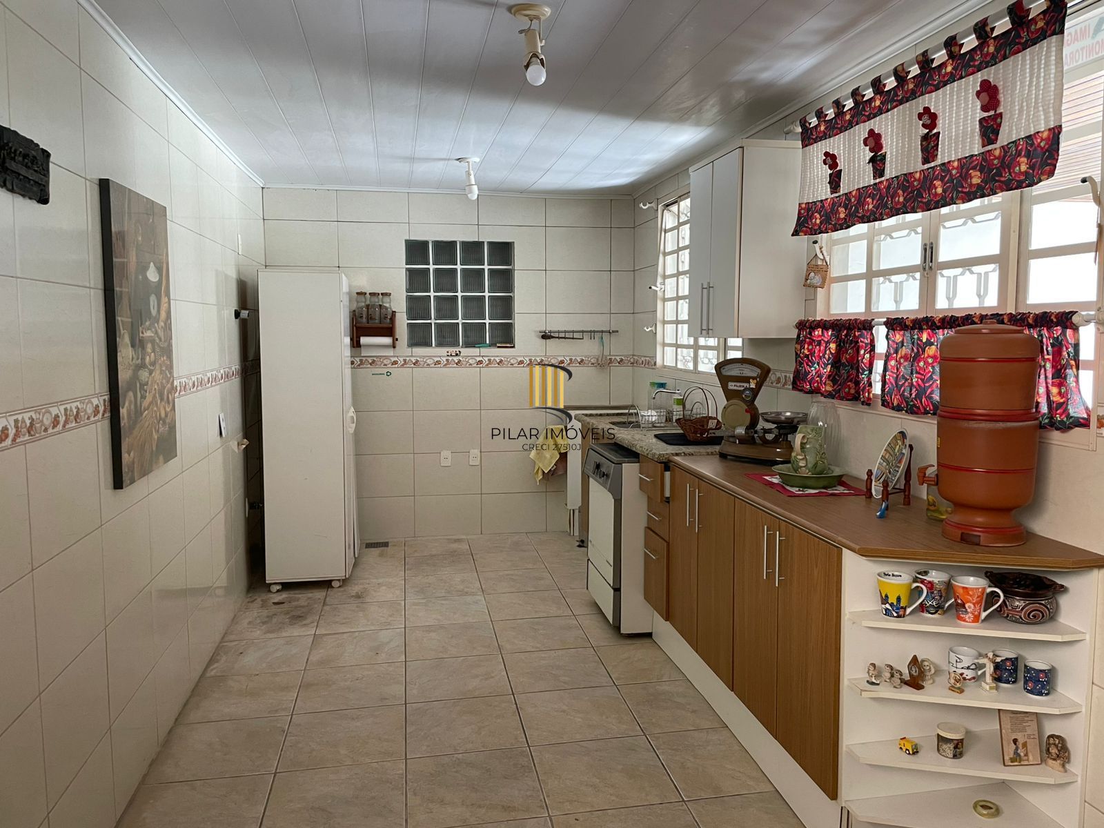 Casa de alvenaria com 104,37m² 3 dormitórios sendo 1 suíte, 2 vagas cobertas