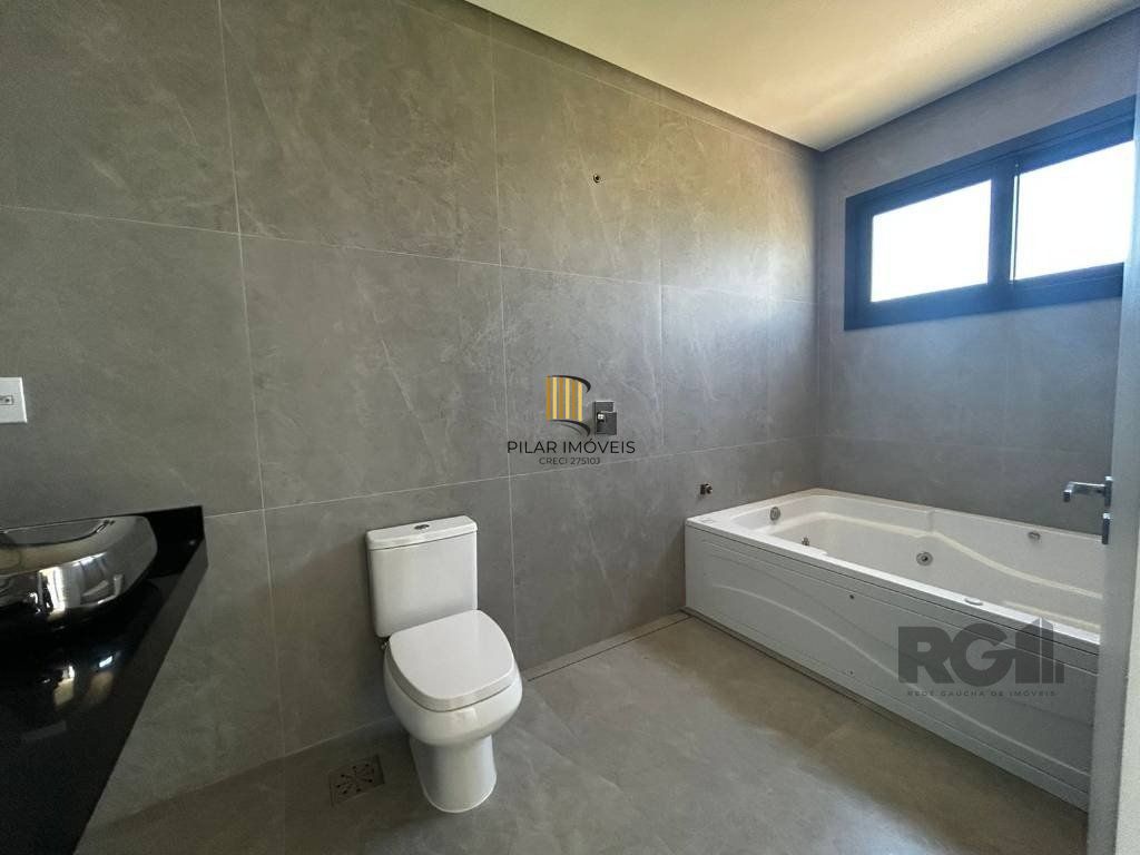 Casa de Condomínio 5 dormitórios no bairro Atlântida Sul