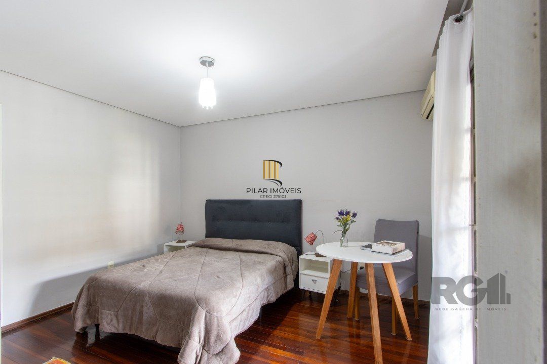 Casa 3 dormitórios no bairro Camaquã