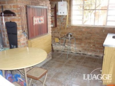 casa com 4 dormitórios, sendo uma suíte , e 530 area privativa