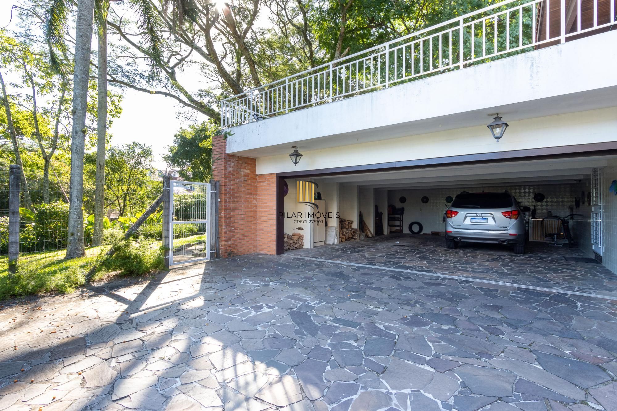 Casa de Condomínio 4 dormitórios no bairro Cavalhada