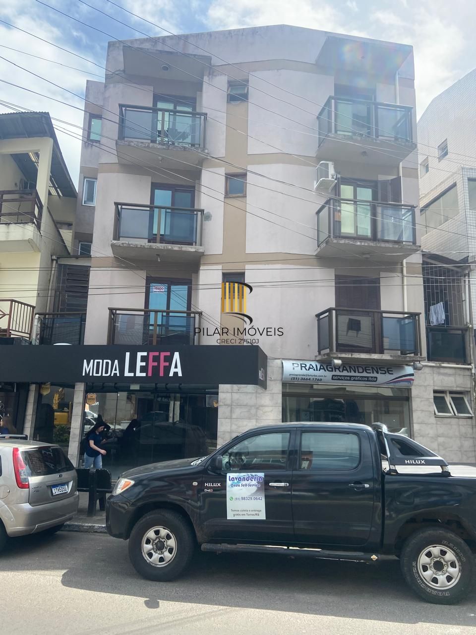 Apartamento com 2 dormitórios e garagem em Torres