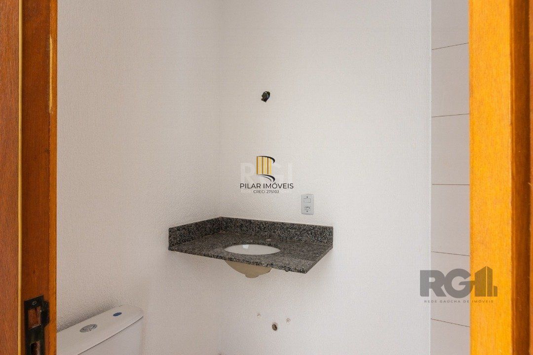 Casa 3 dormitórios no bairro Guarujá