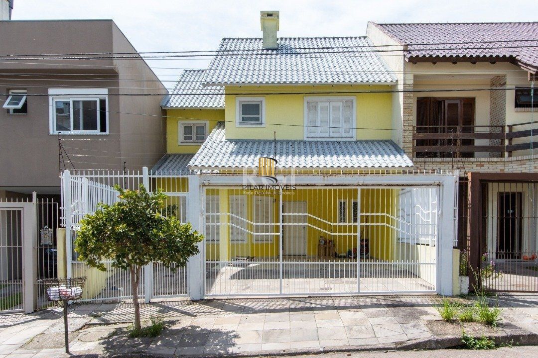 Uma suíte, estar íntimo, living 2 ambientes, lareira, lavabo, cozinha mobiliada, - Pilar Imóveis