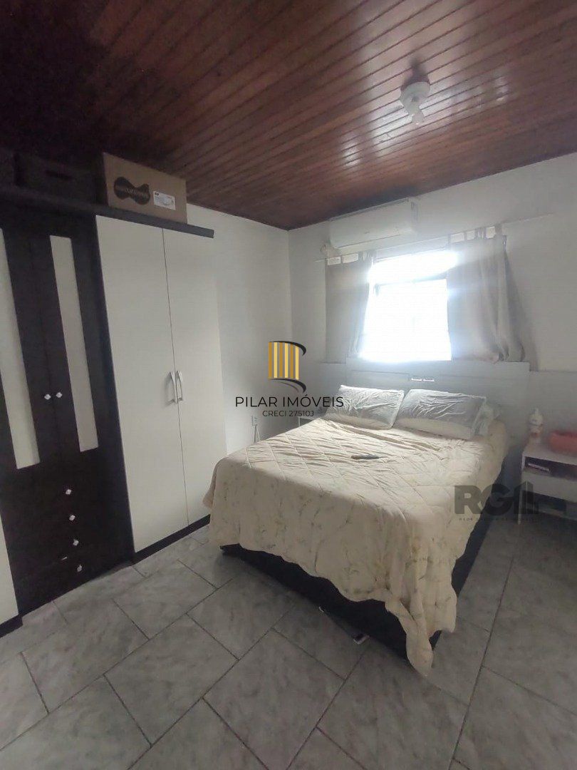 Casa de 3 dormitórios, 1 suíte e 2 vagas de garagem em Viamão.