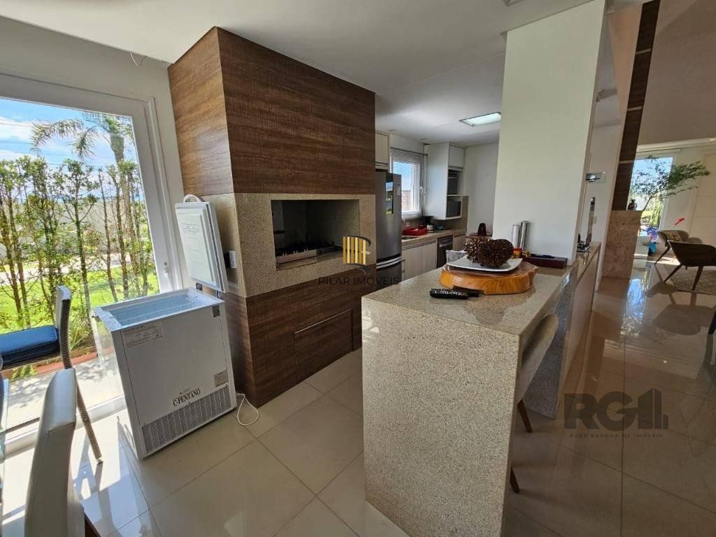 Casa de Condomínio 4 dormitórios no bairro Atlântida Sul