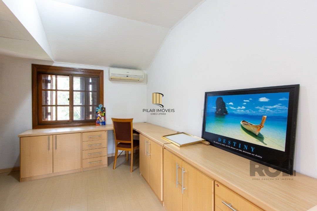 Casa de Condomínio 3 dormitórios no bairro Camaquã