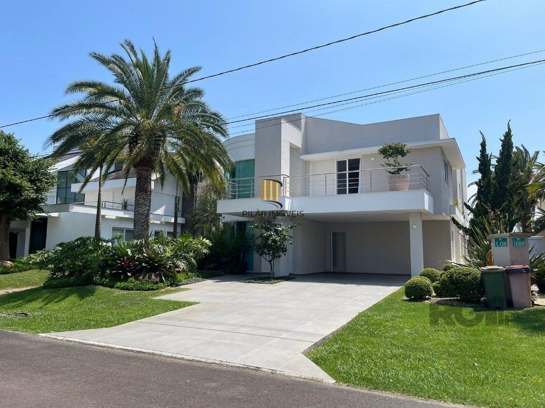 Casa de Condomínio 5 dormitórios no bairro Atlântida Sul - Pilar Imóveis