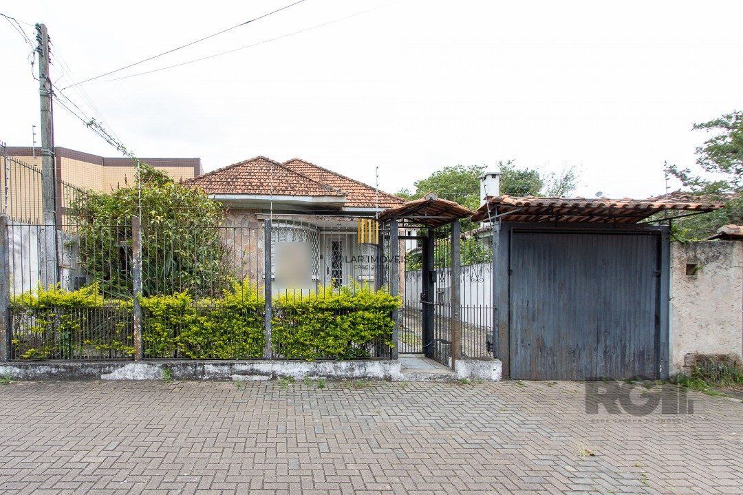 Casa 5 dormitórios no bairro Ipanema