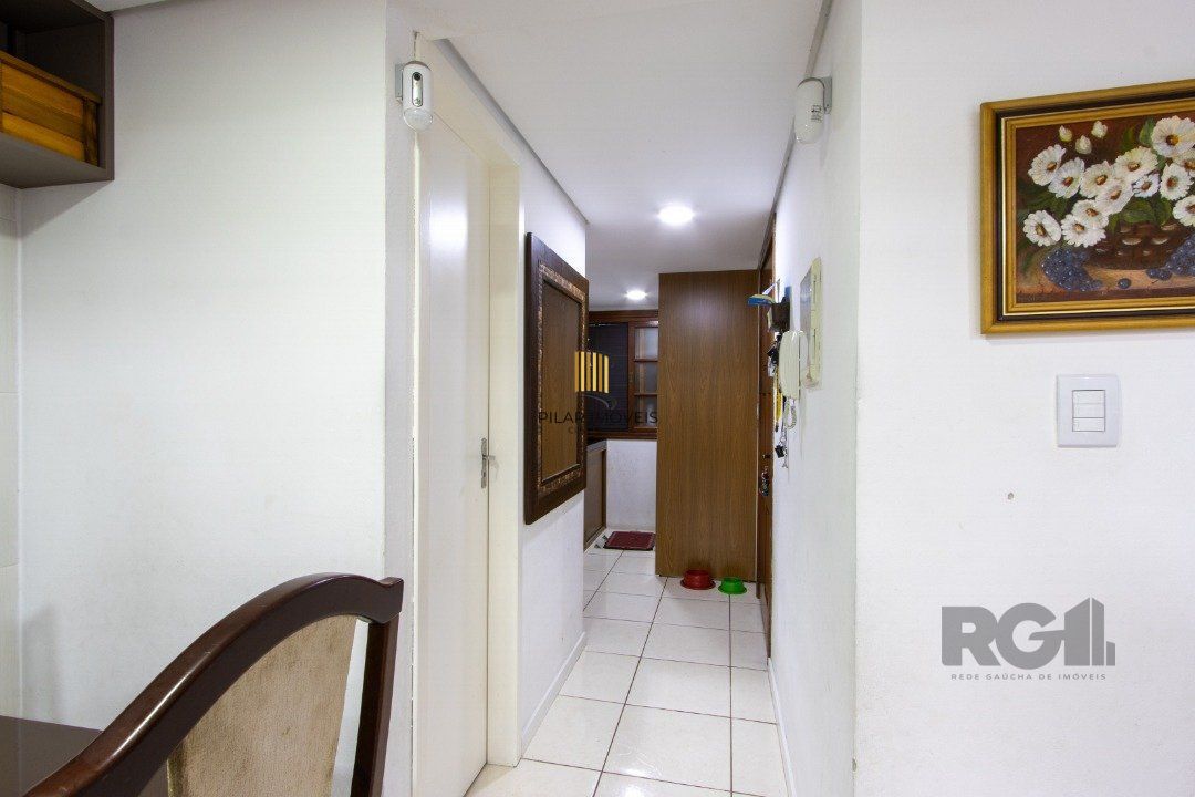 Casa de Condomínio 3 dormitórios no bairro Camaquã