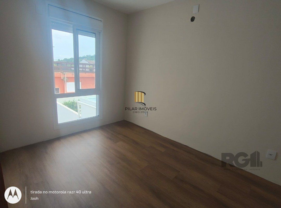 Casa em Condomínio fechado com 3 dormitórios no bairro Vila Nova em Porto Alegre, RS