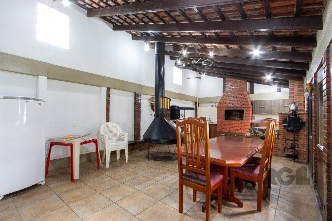 Casa para Venda - 440m², 3 dormitórios, sendo 1 suites, 2 vagas - Santa Tereza