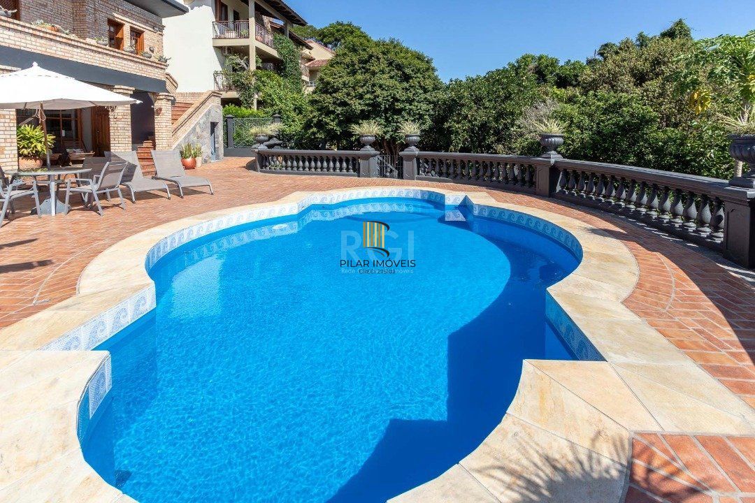 Casa Condominio para Venda - 559m², 4 dormitórios, sendo 3 suites, 3 vagas - Cavalhada