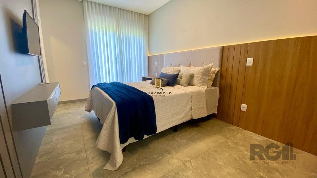 Casa de Condomínio 5 dormitórios no bairro Atlântida Sul