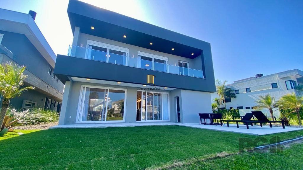 Casa de Condomínio 5 dormitórios no bairro Atlântida Sul - Pilar Imóveis
