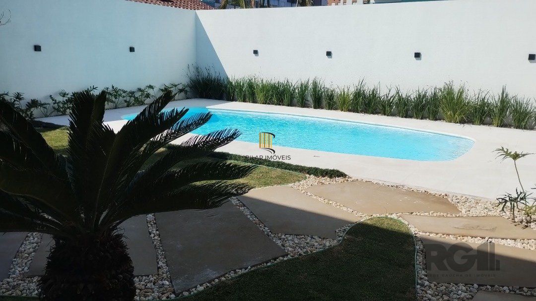 Casa 5 dormitórios no bairro Atlântida